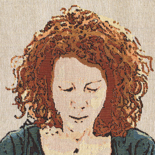 Geneviėve is depicted as a woven self-portrait from 2015, depicted wearing a green top.